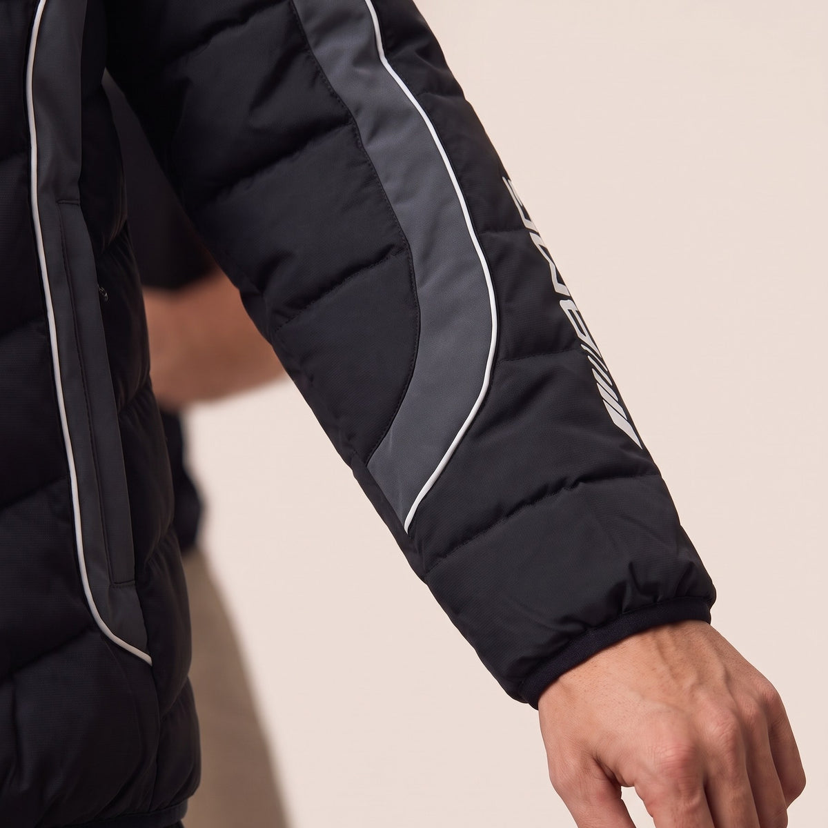 Close-up of the AMG badge and piping on the sleeve