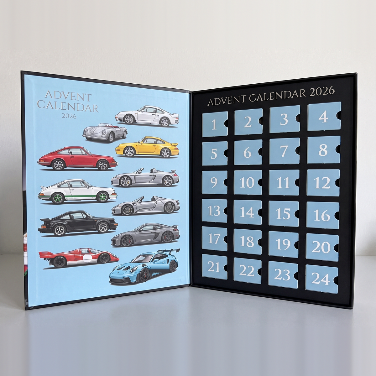 The calendar opened: illustrated car line-up and 24 numbered doors