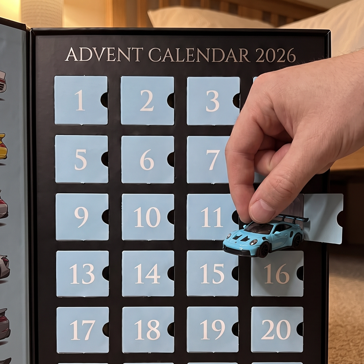 Lifting a 1:64 die-cast car out of its door