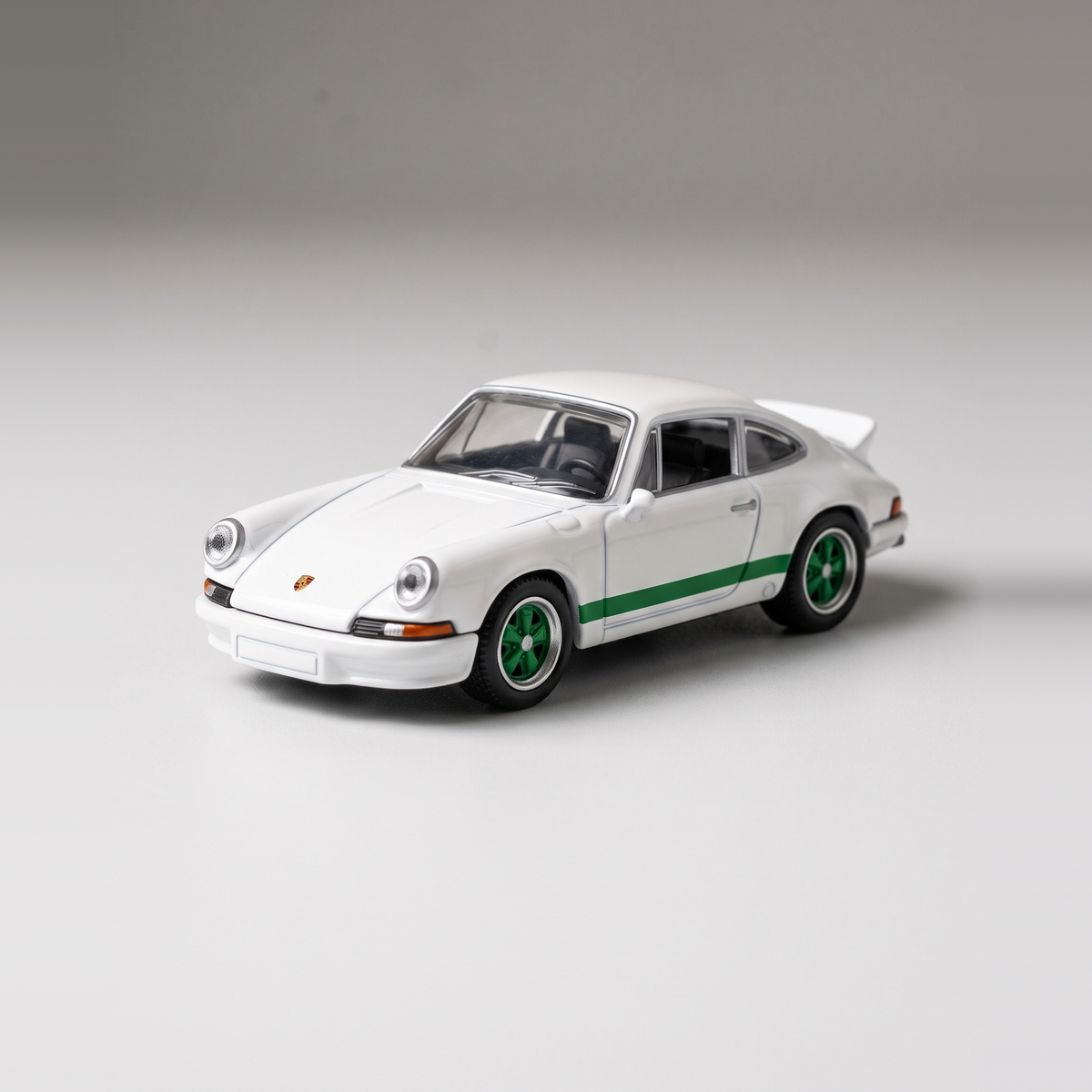 White RS 2.7 1:64 die-cast car with green stripes