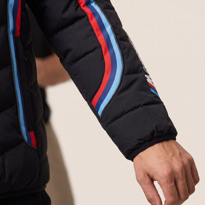 Close-up of the M stripes and badge on the sleeve