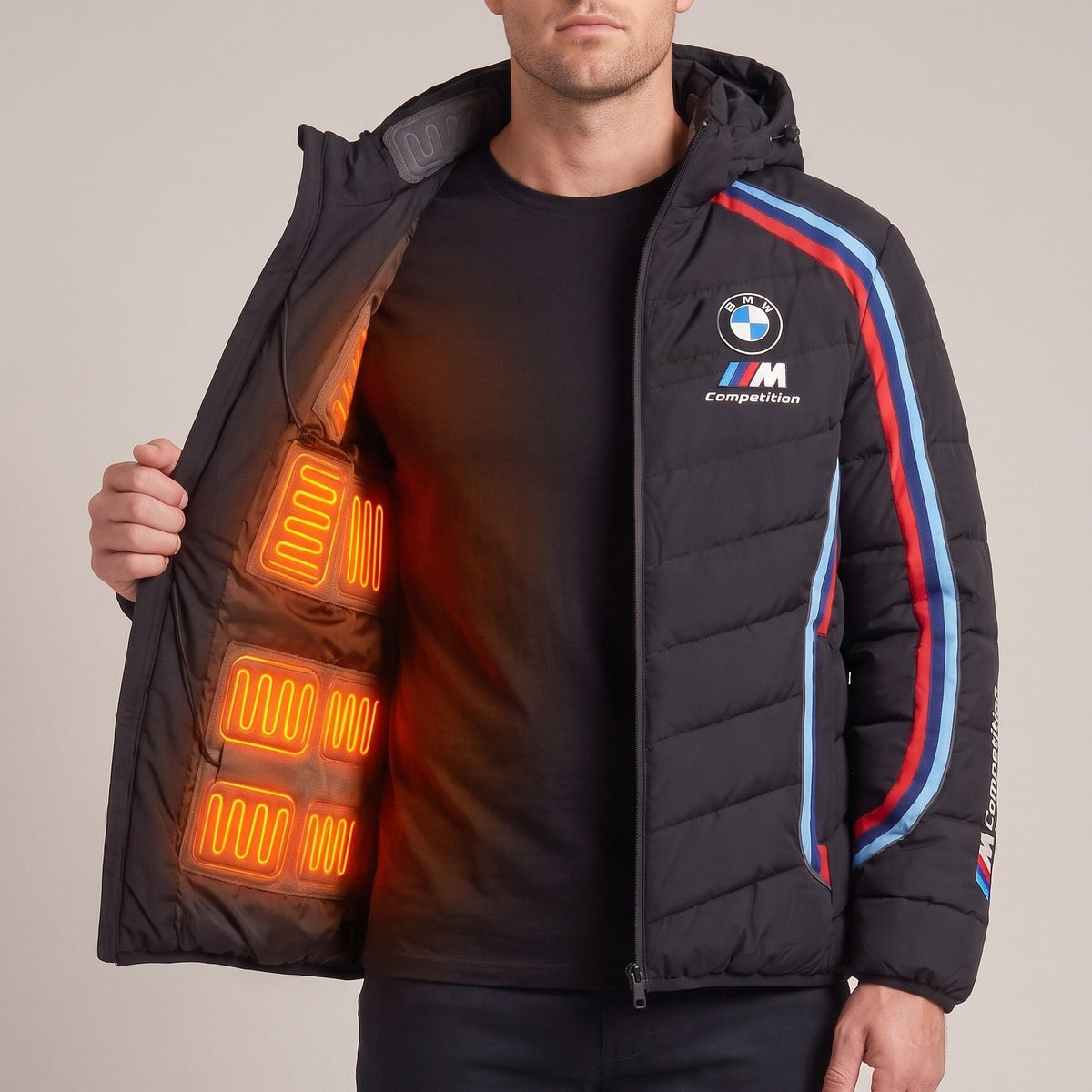 BMW M heated puffer jacket worn open, with the heating pads glowing orange inside
