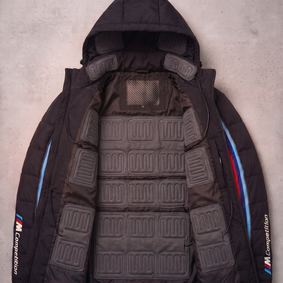 BMW M edition heated jacket opened to show the heating pads in the lining