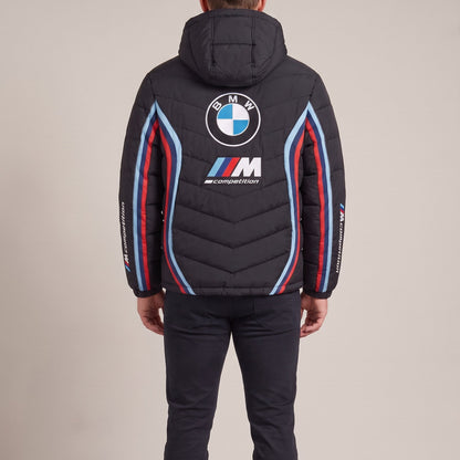 Man wearing the BMW M heated puffer jacket, back view